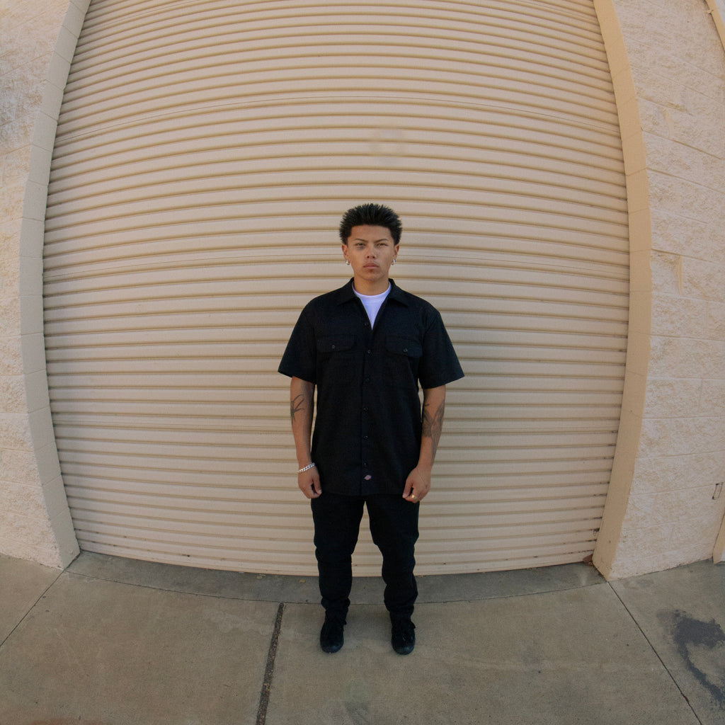 b. Black Button-up