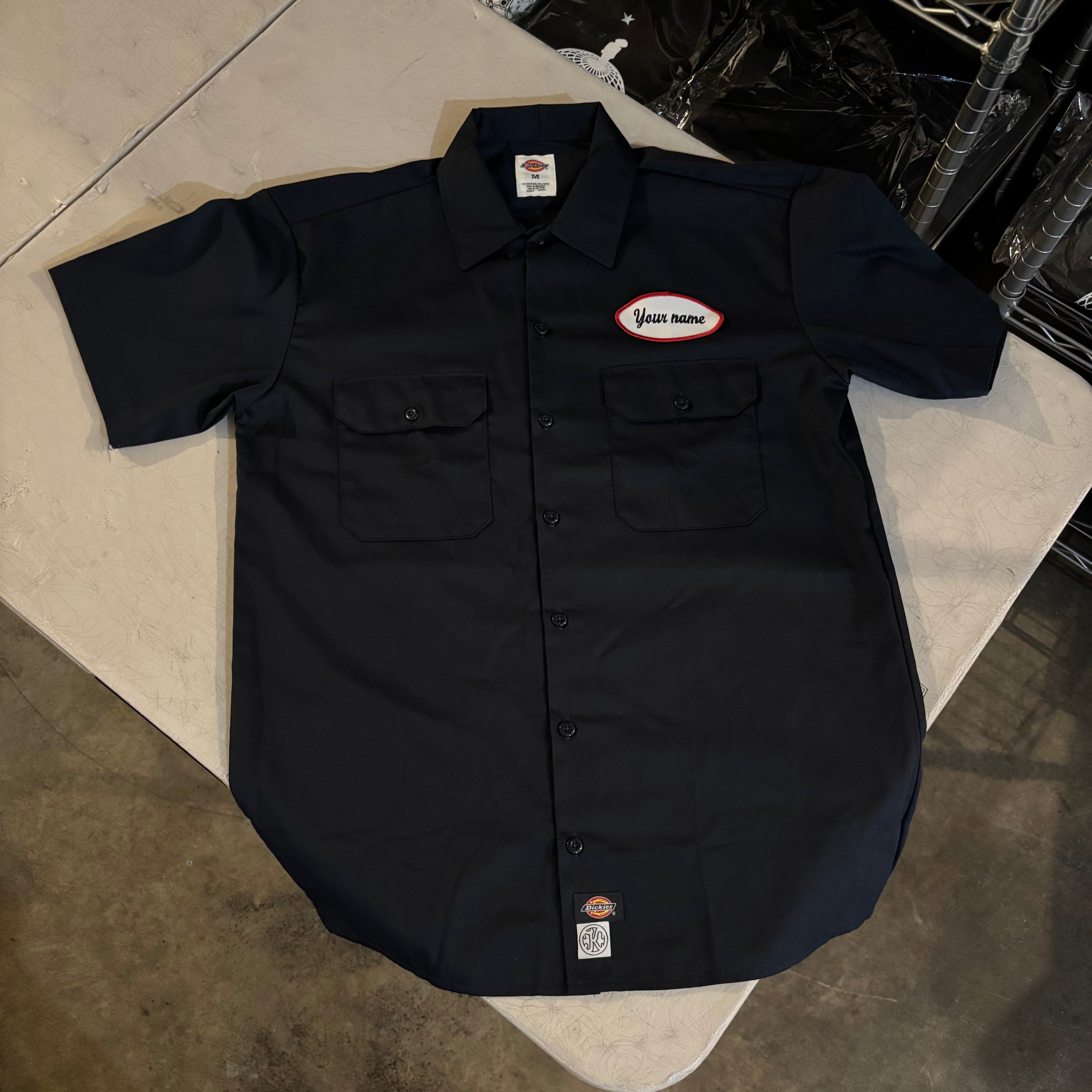 b. Navy Blue Button-up